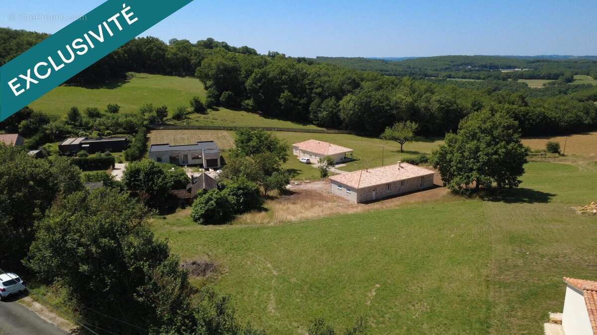 Photo 2 - Terrain à TERRASSON-LAVILLEDIEU