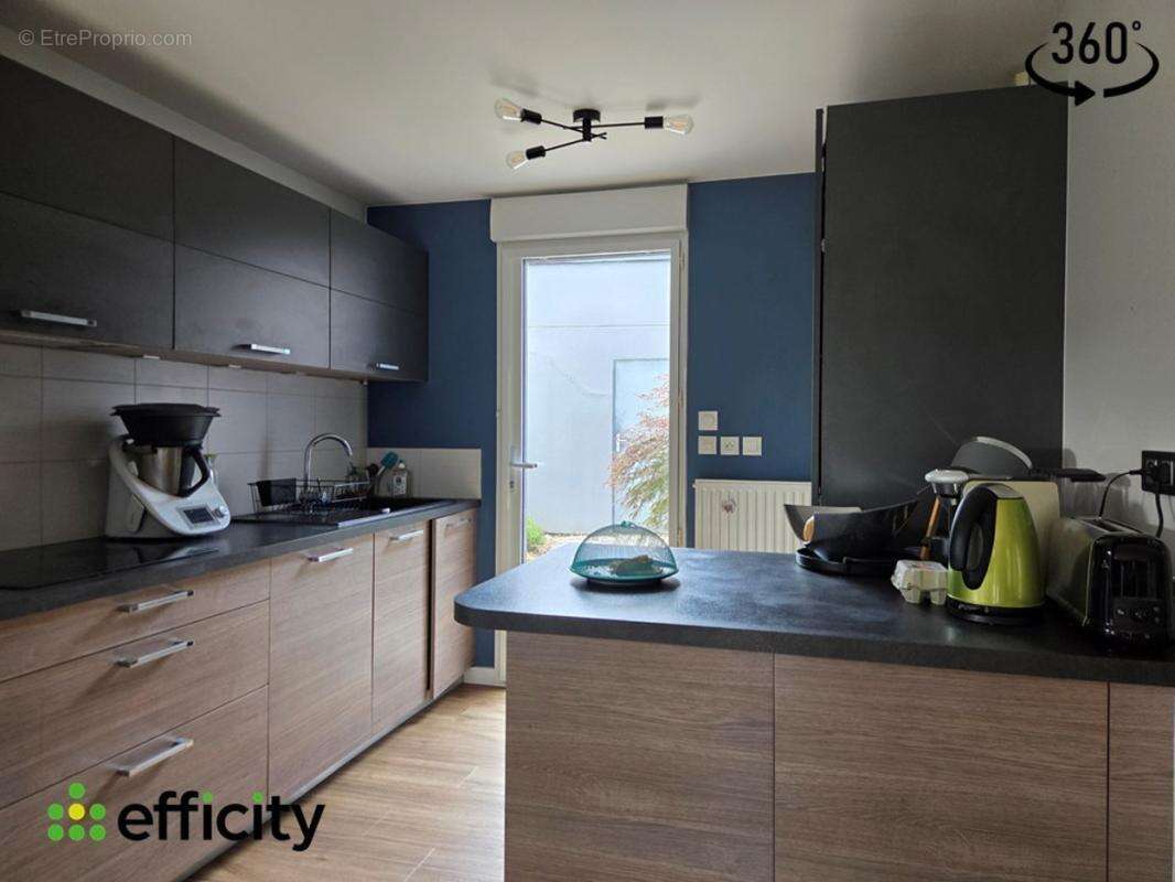 Maison 127 m² à La Chapelle-Des-Fougeretz  - photo 8