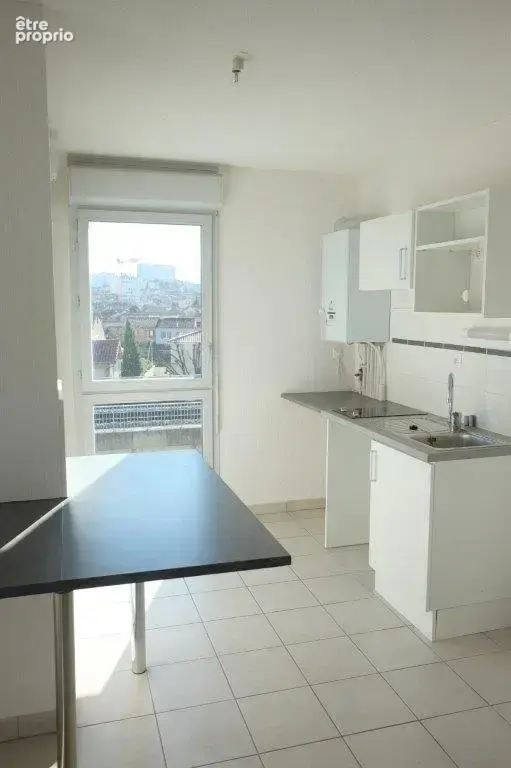 T3 de 61 m² balcon et un parking en sous-sol - photo 4