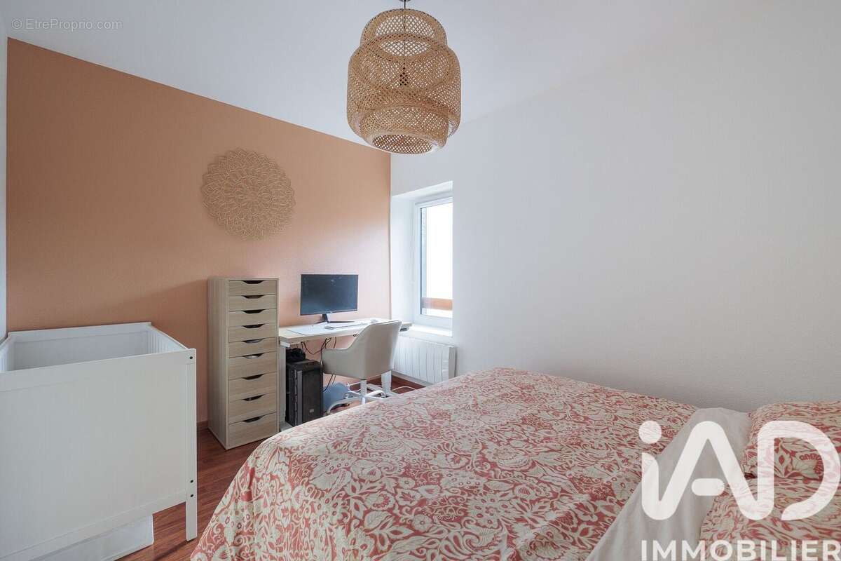 Photo 8 - Appartement à SAINT-GENIS-LES-OLLIERES