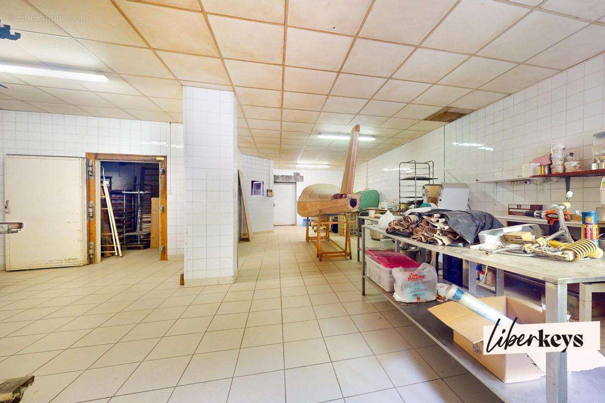 Immeuble comprenant deux habitations et un commerce - photo 8
