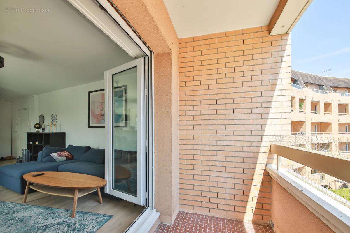 Appartement de 3 pièces de 70,5 m² à Cachan vendu loué meublé - photo 5