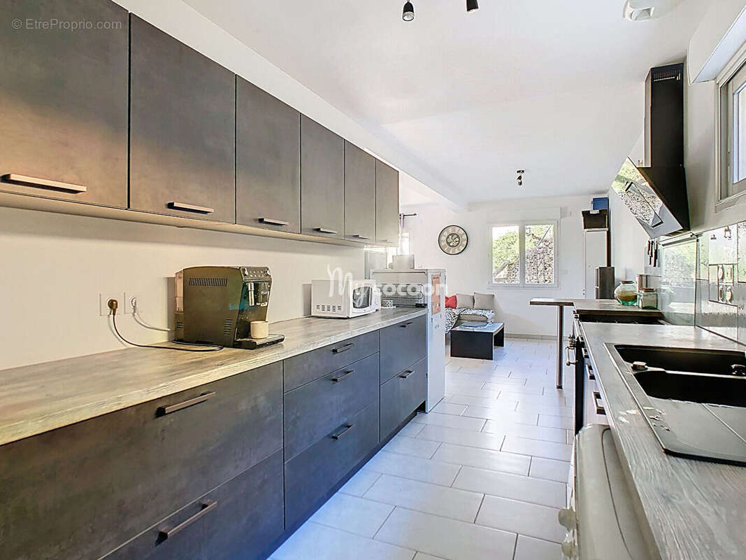 Maison - T5 -110 m² - photo 11