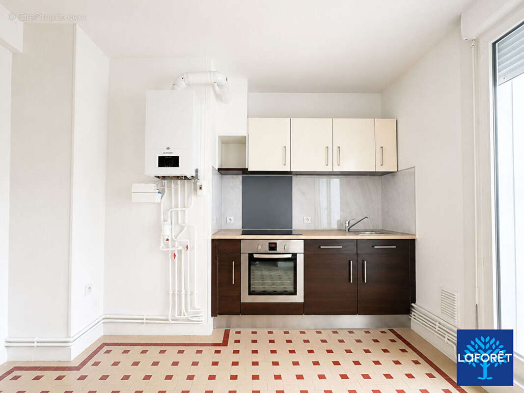Appartement 2 chambres entièrement rénové - photo 8