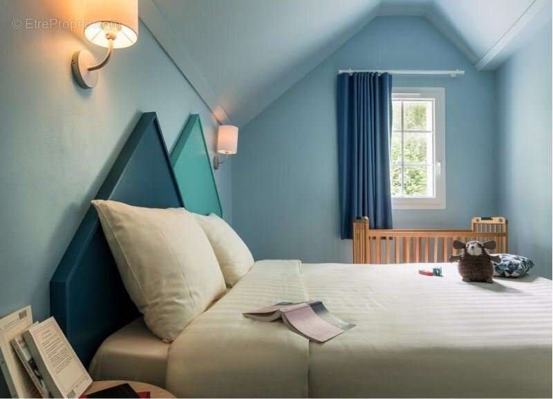 INVESTISSEMENT LOCATIF  CHAMOUILLE  Résidence de tourisme Center Parcs Le Lac d'Ailette - 6% de rentabilité - photo 6