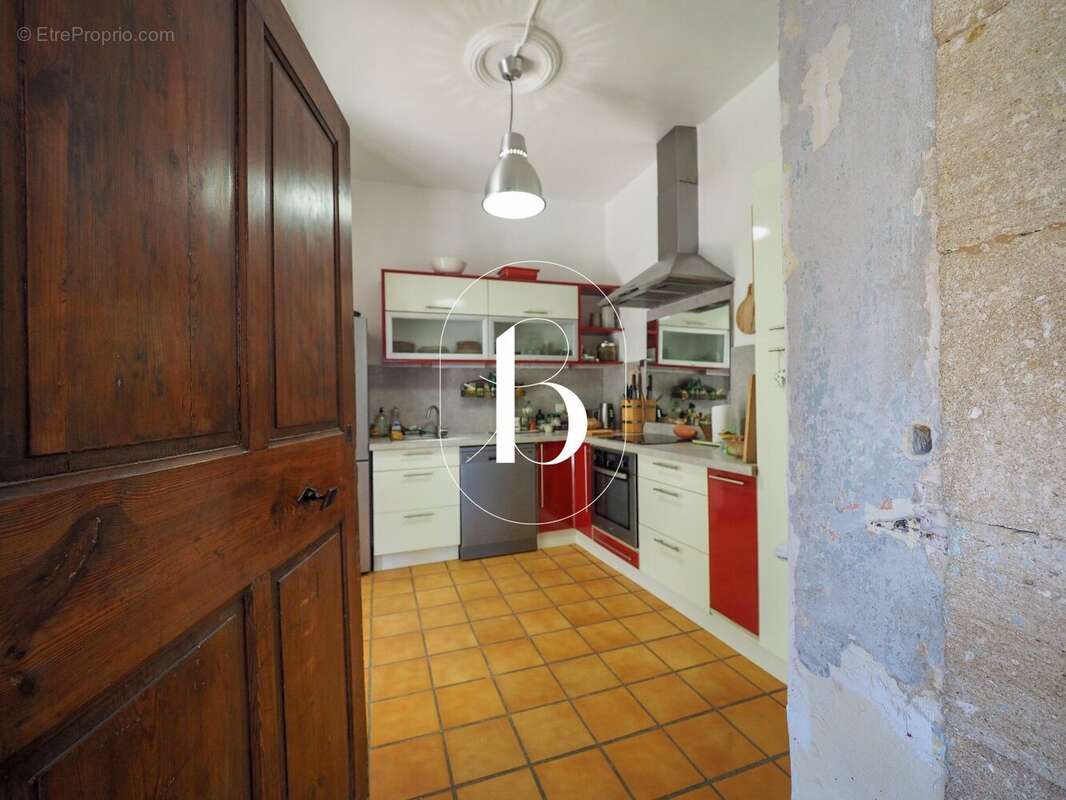 Maison à LAUDUN-L'ARDOISE