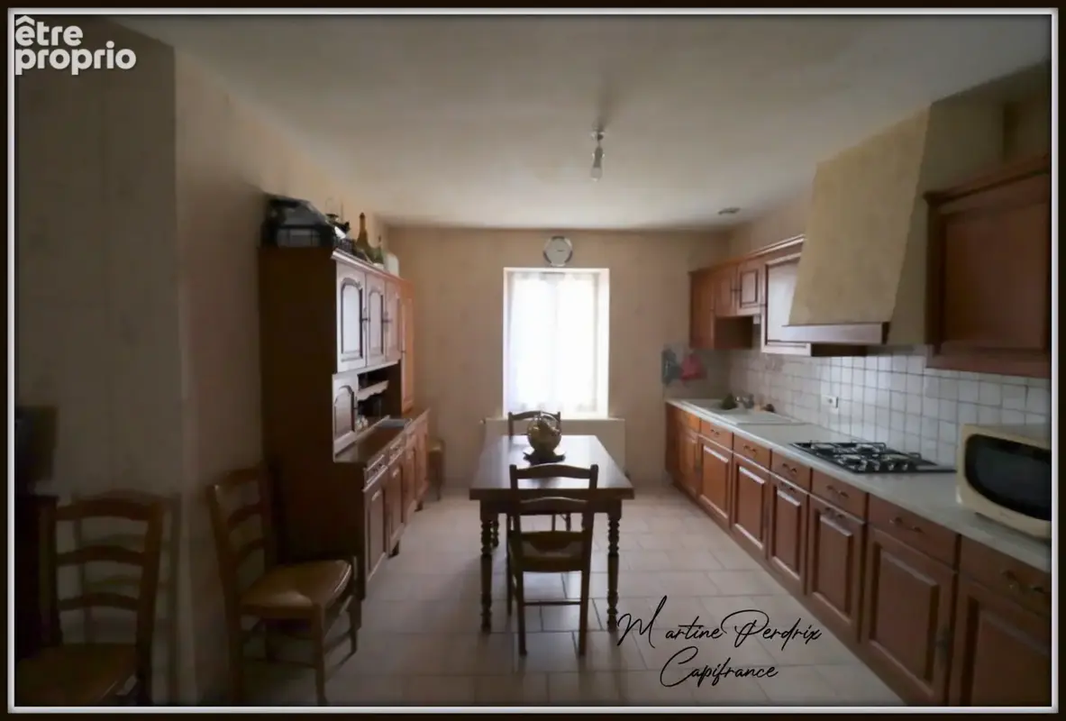 Maison 101 m², 3 pièces à CORMOZ (01) - photo 2