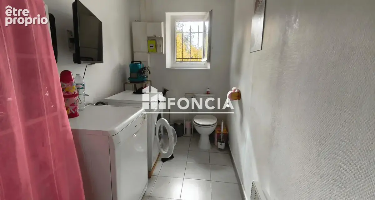 Immeuble de 2 appartements et une maison en centre ville de Dordives - photo 12