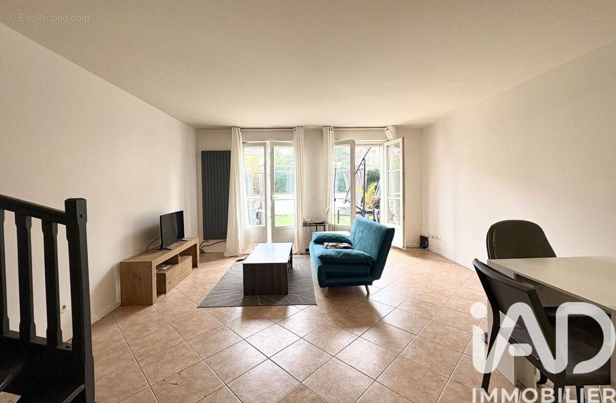 Photo 2 - Maison à SAVIGNY-LE-TEMPLE