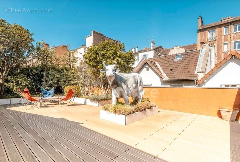 Maison à COURBEVOIE