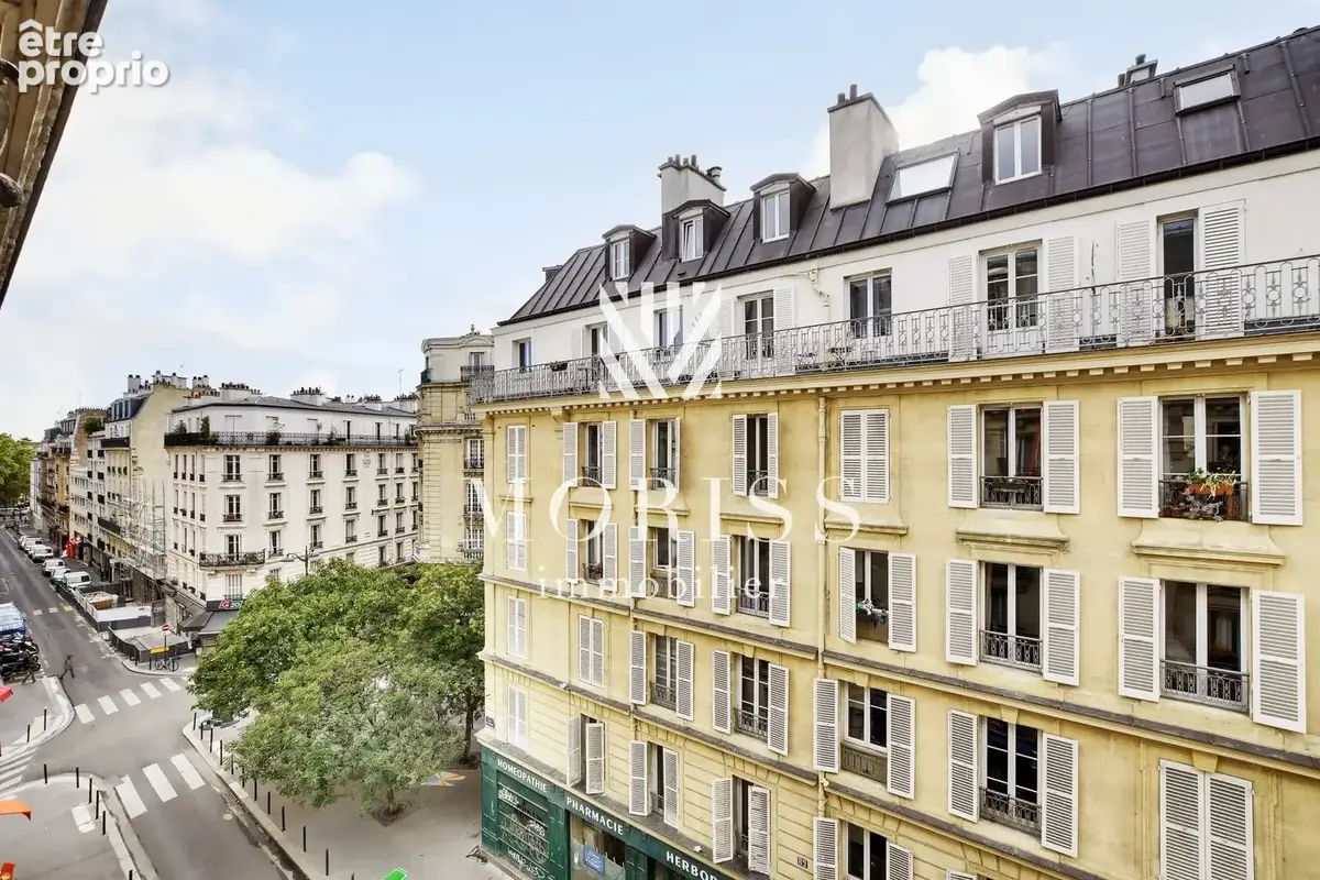 Appartement 5 piéces rue duhesme 75018 paris - photo 4