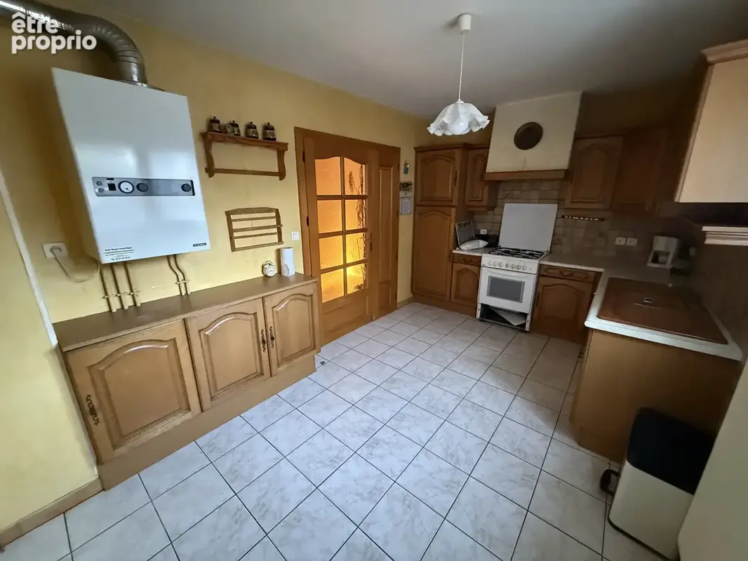 Maison 6 pieces de 102 m2 avec 5 chambres (quartier huchet) - photo 3