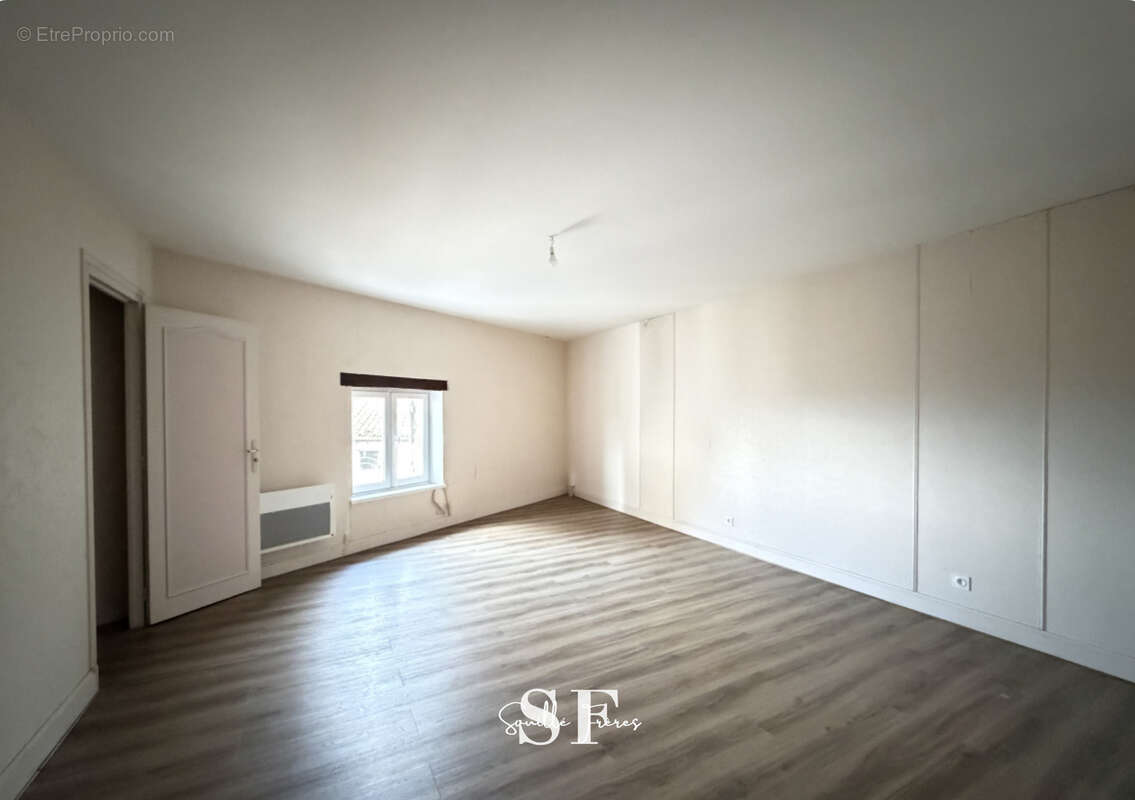 Rive gauche, immeuble de caractere appartement et local commercial - photo 10