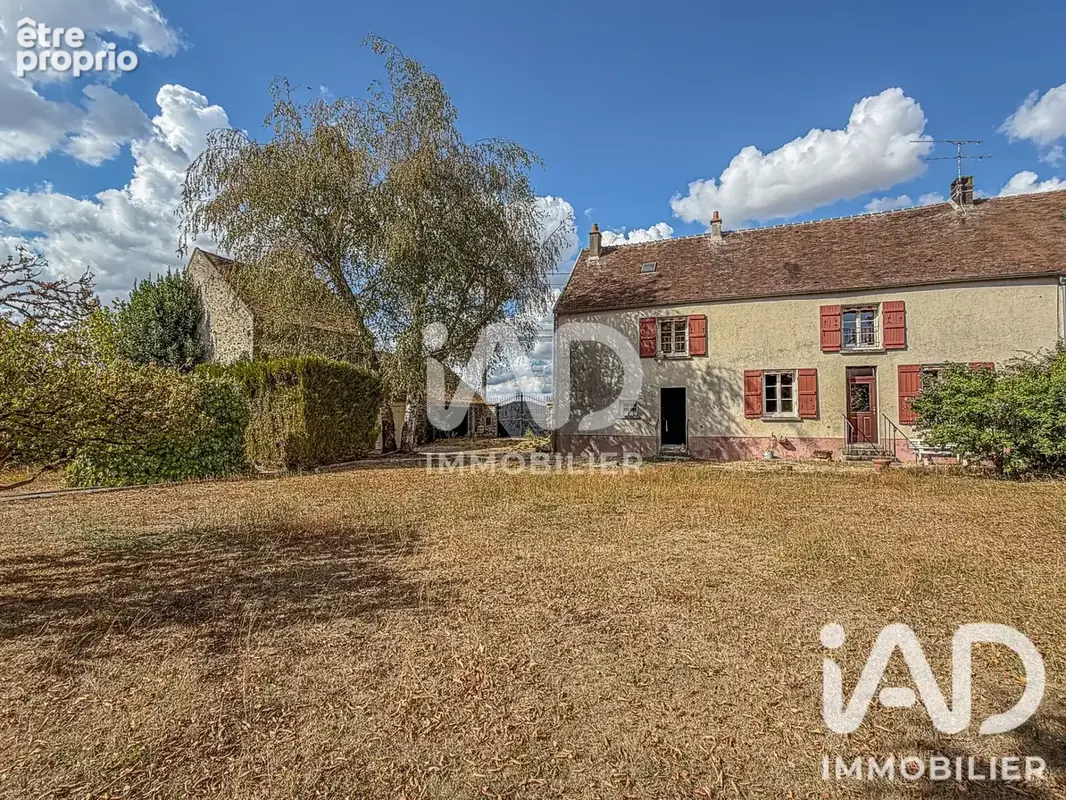 Photo 1 - Maison à TOUQUIN
