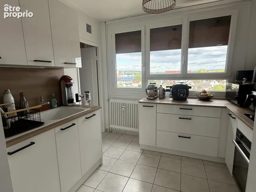 Appartement T3 avec balcon - parking et cave - SENS - photo 4