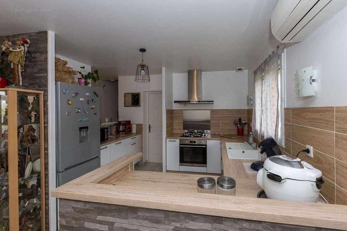 Maison à MONTAGNIEU