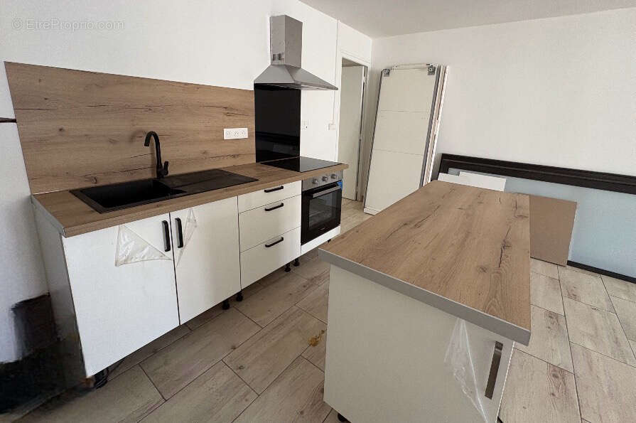 Appartement T2 proche centre-ville - photo 3