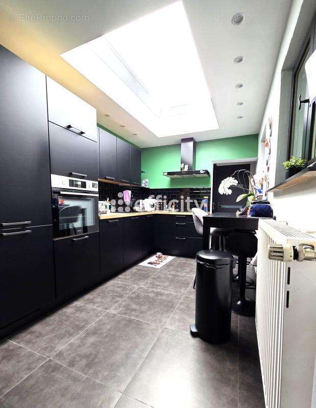 Maison 90 m² à Wattrelos  - photo 9