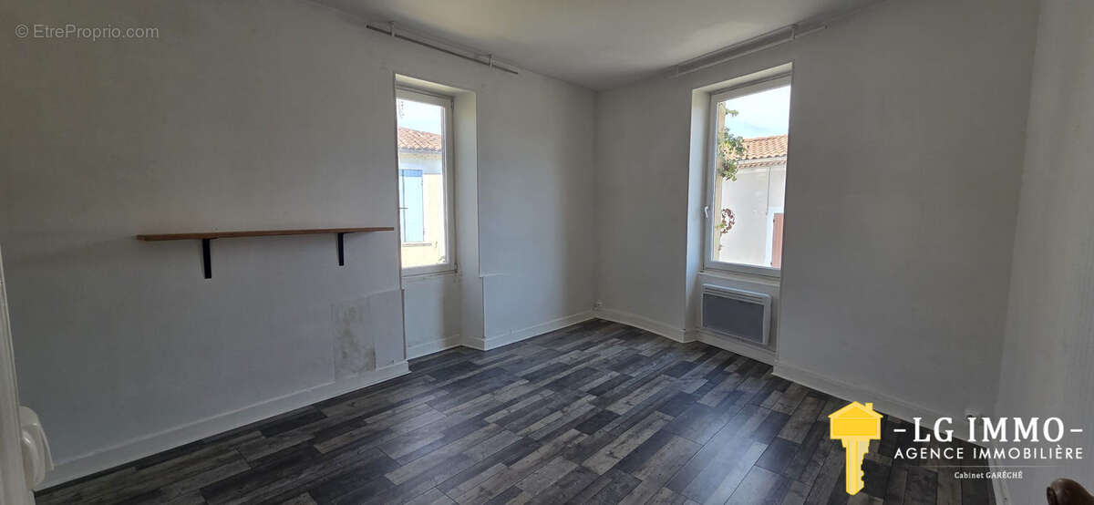 Appartement t3 + local commercial, centre bourg de mortagne - photo 6