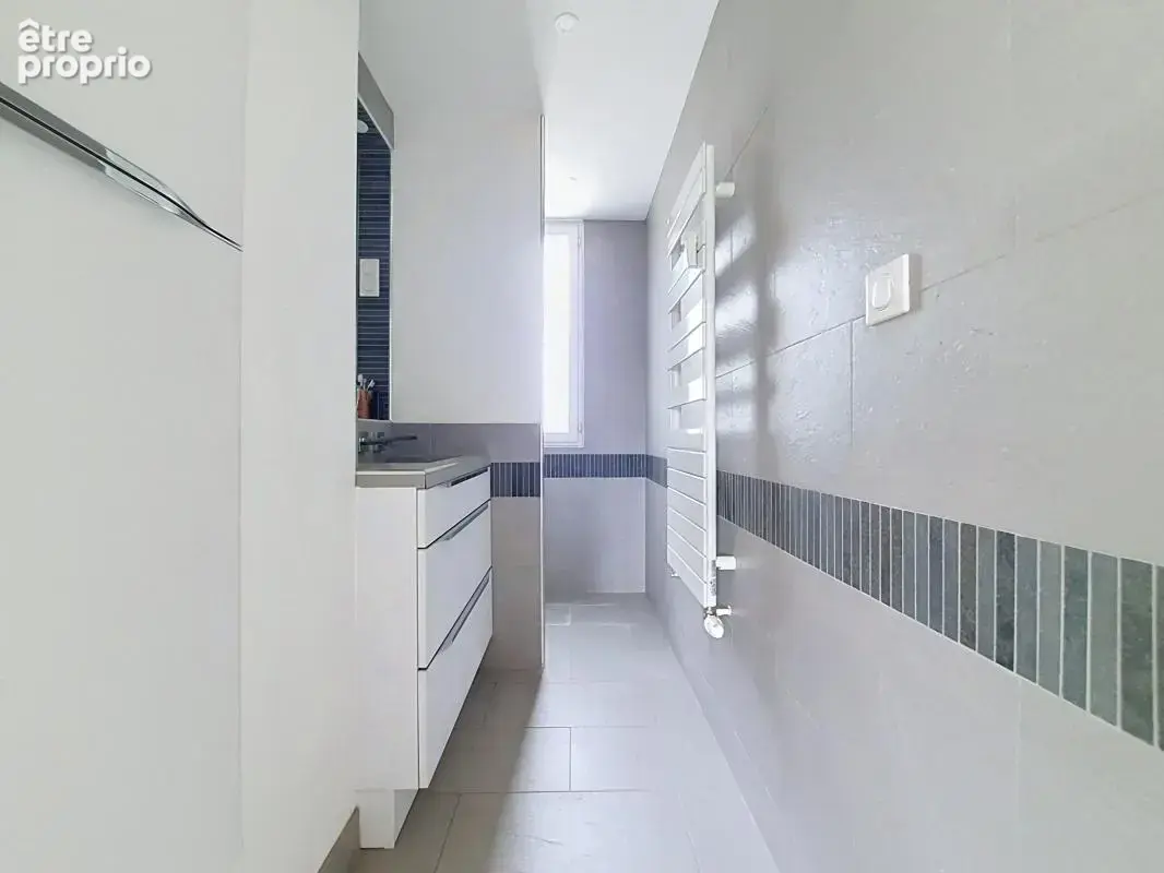 Appartement rénové - 2 chambres - Balcon - Cave - Stationnement facile - photo 12