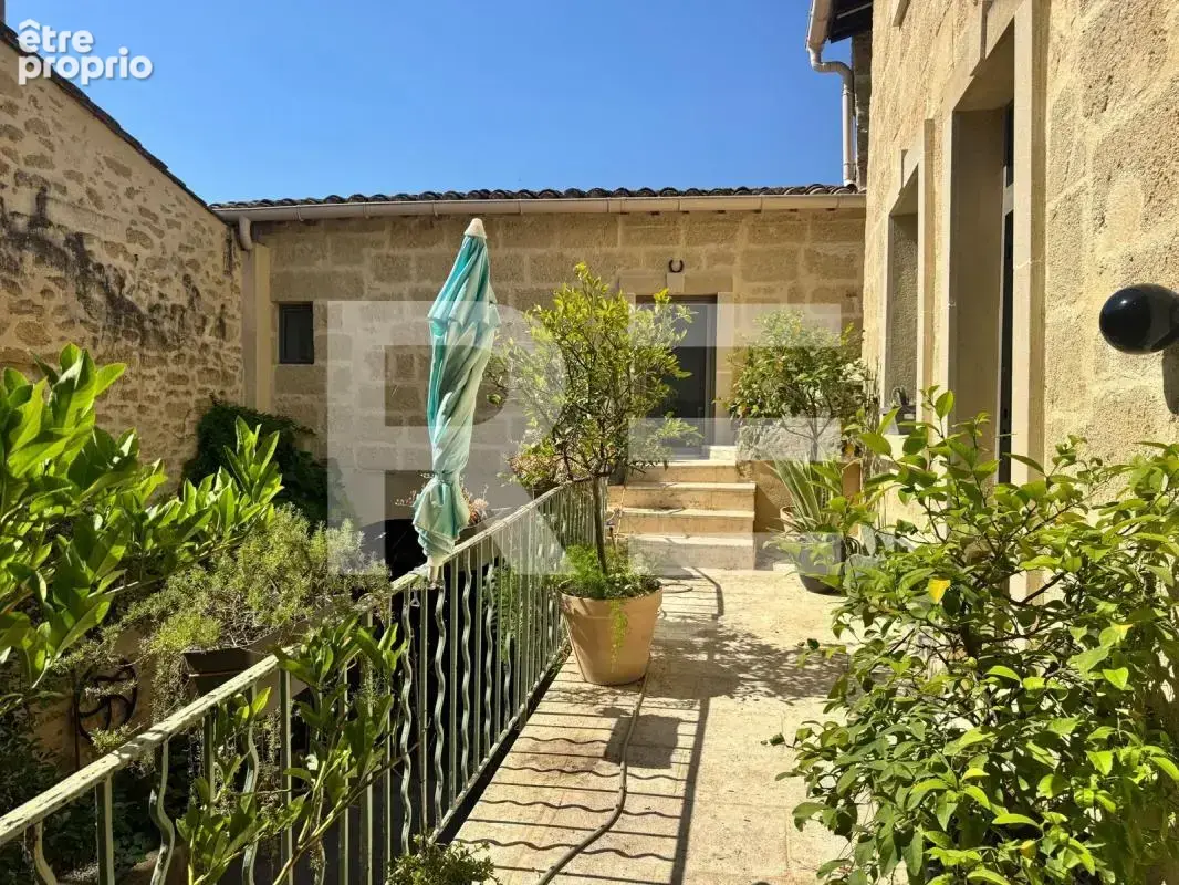 Belle maison de village avec patio, jardin, garage et T2 - photo 4