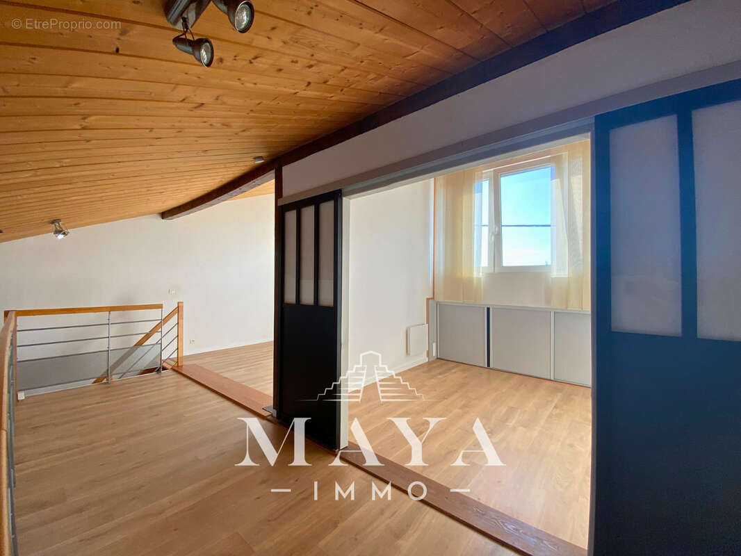 Appartement F3 en Duplex avec parking - photo 8