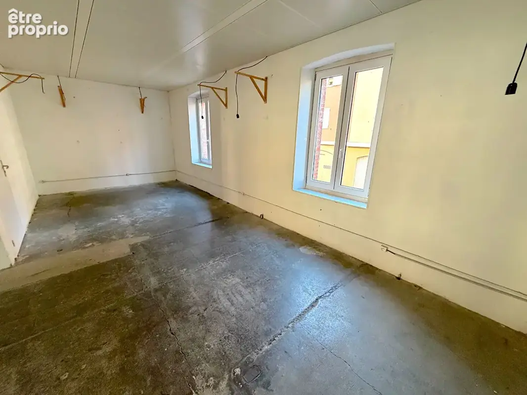 Local commercial 55 m² Rez-de-chaussée - photo 7