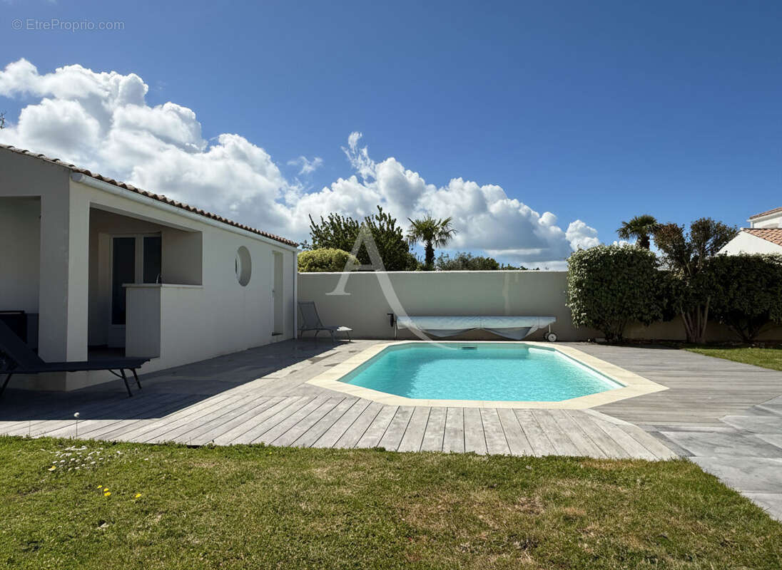 PUILBOREAU  Maison de 142 m² - photo 9