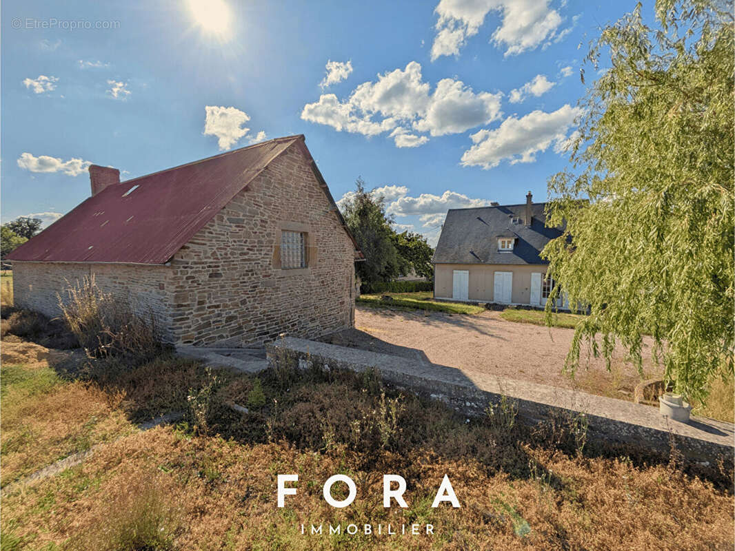 Maison à CONDE-SUR-NOIREAU