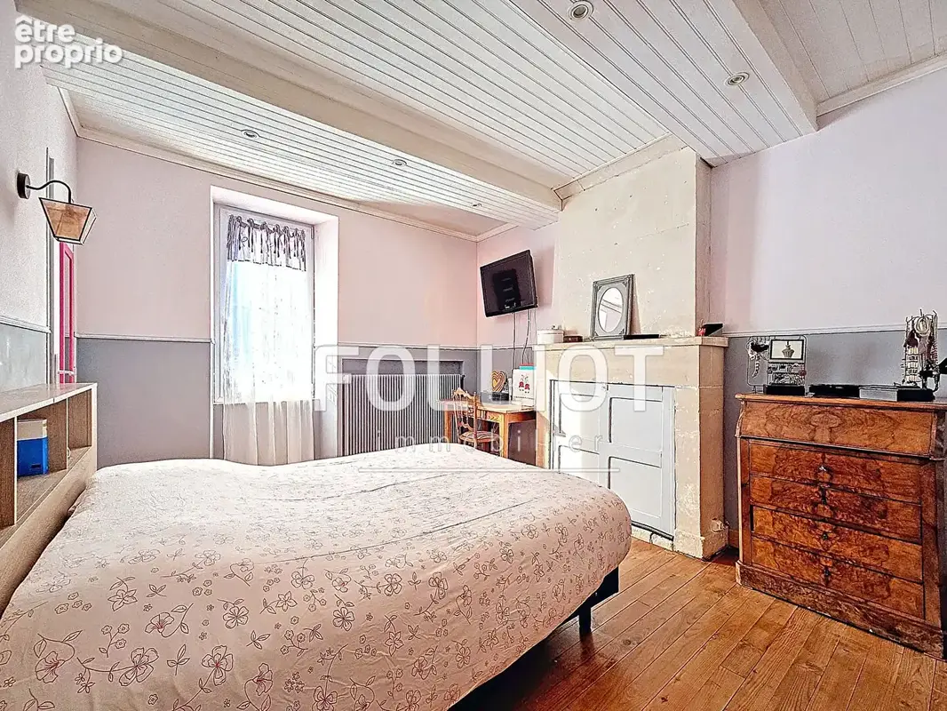 Maison en PIERRE de140 m²  de 7 pièces et 4 chambres avec un garage  àThaon - photo 10