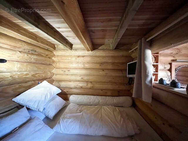 Chalet bois + terrain attenant d'un hectare et demi - photo 5