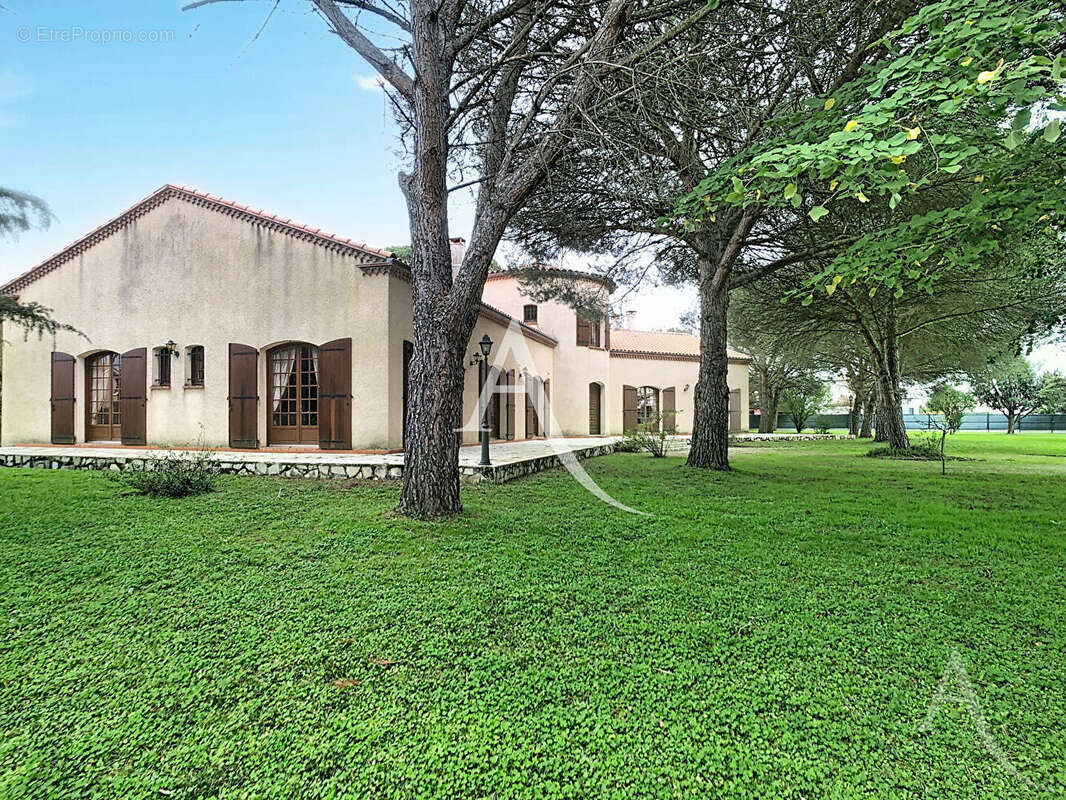 Villa T5 avec parc arboré de 1692m² , double garage- PINS JUSTARET - photo 2