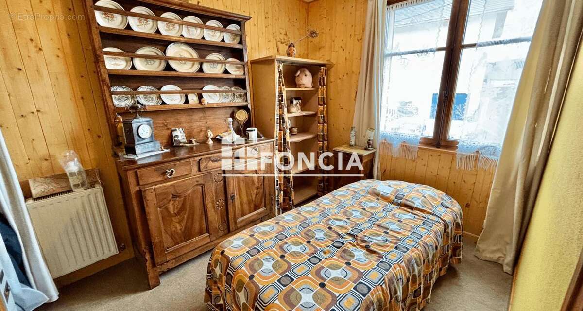 MONTAGNOLE Maison esprit savoyarde sur 1 400 m2 de terrain arboré, bien exposée et vue dominante - photo 6