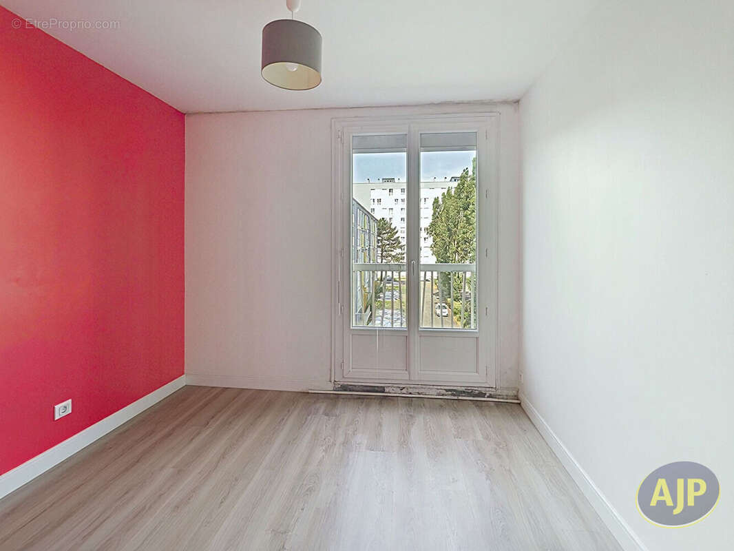 Appartement T4 - 3 chambres - BOURG L'EVEQUE - photo 4