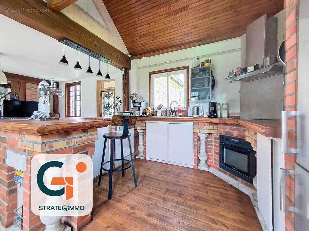 Maison à SAINT-OUEN-DE-THOUBERVILLE