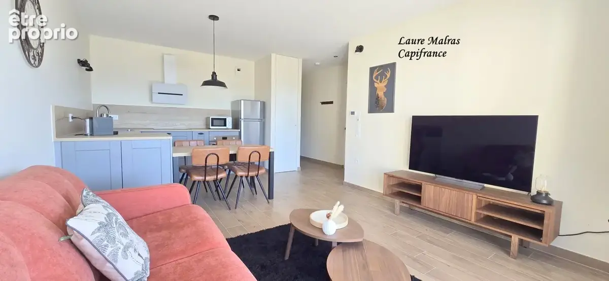 GROISY – A vendre beau T2 avec balcon, vue montagnes, cave, 2 stationnements privatifs - photo 2