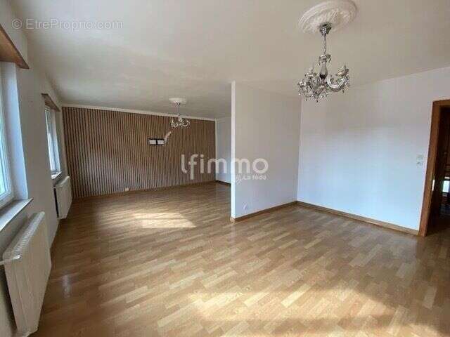 Immeuble comprenant un local commercial et deux appartements - photo 16