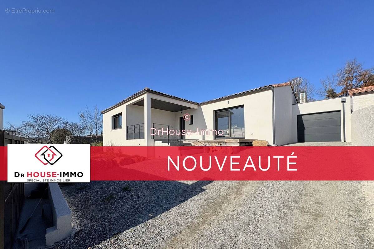 Maison à COUFFOULENS