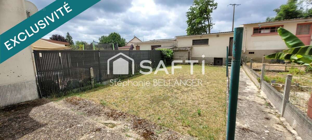 Photo 2 - Maison à NOYEN-SUR-SARTHE