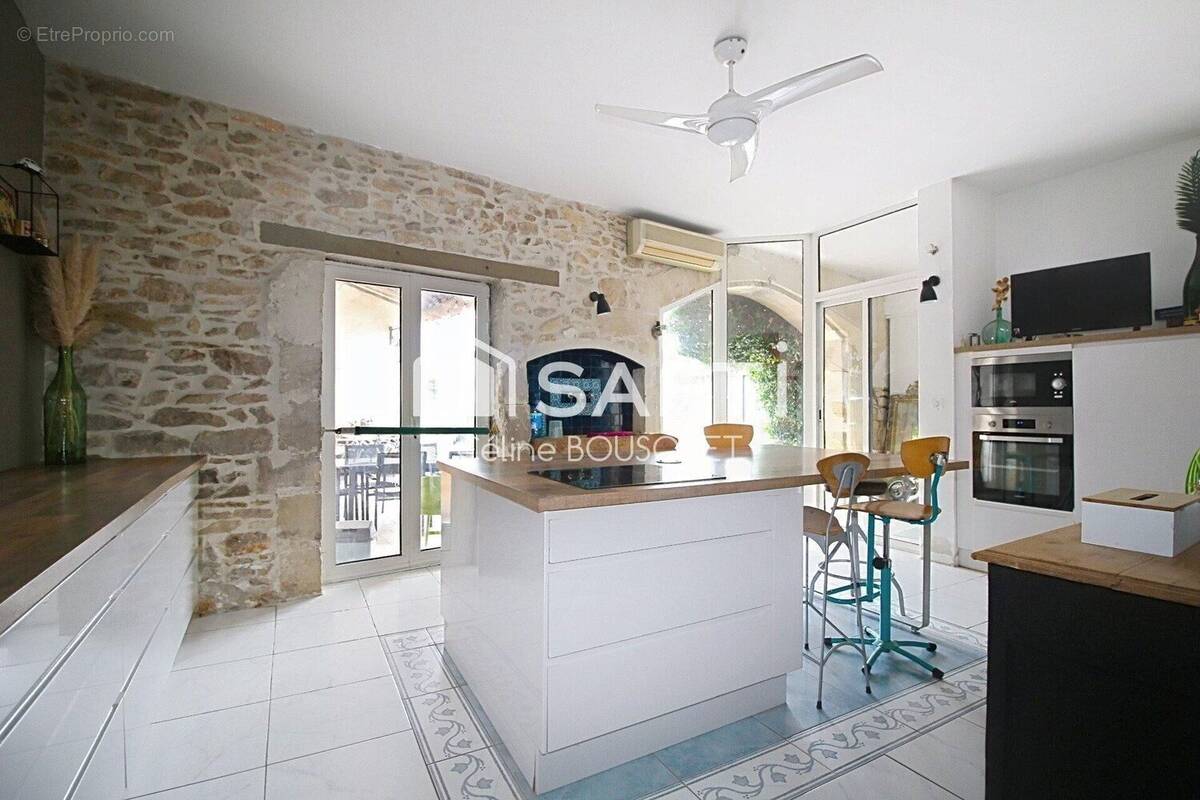 Photo 1 - Maison à UCHAUD