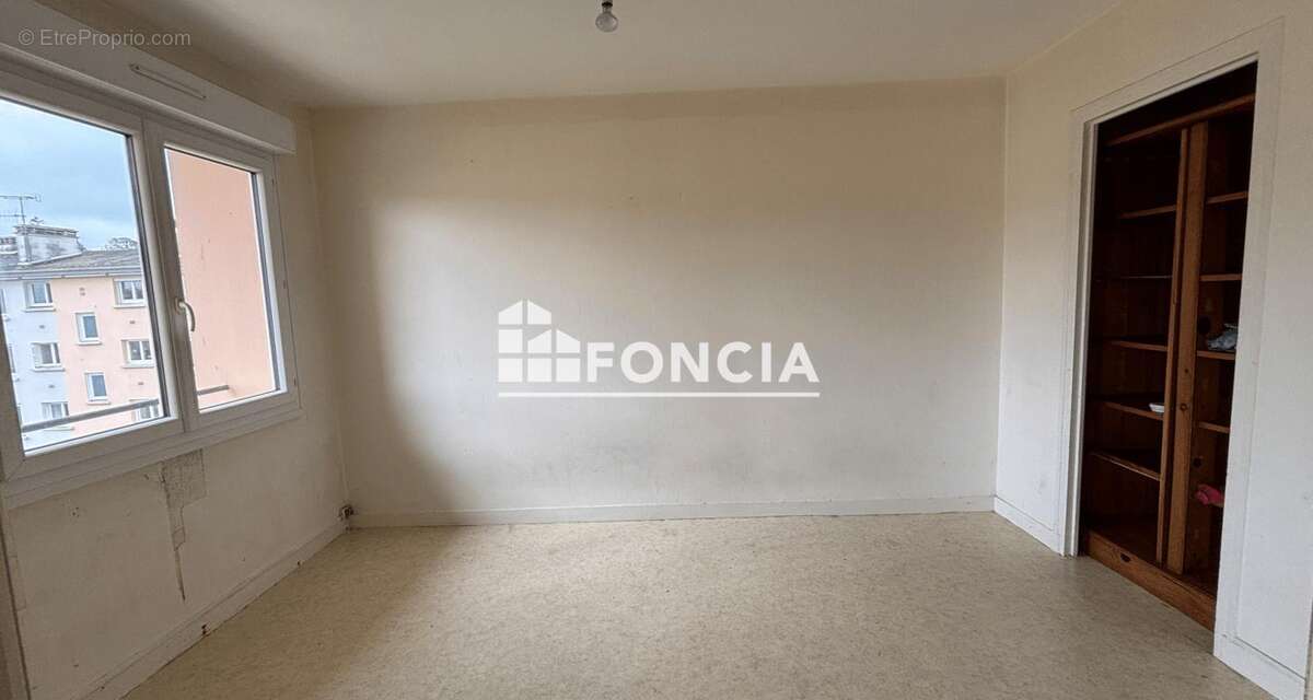Appartement T4 - proche centre ville à pied - photo 2