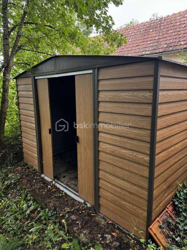 Maison de village avec jardin et garage : un fort potentiel à petit prix - photo 13