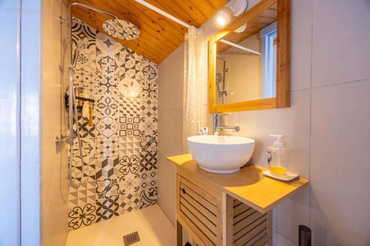 Maison de 101m² - photo 11