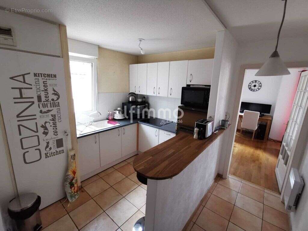 Bischheim Centre – T2 de 48 m² avec balcon et parking privatif - photo 4