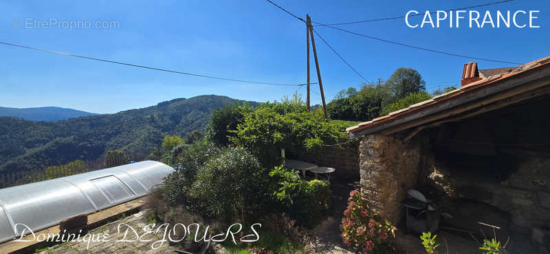 Maison à SAINT-MICHEL-DE-CHABRILLANOUX