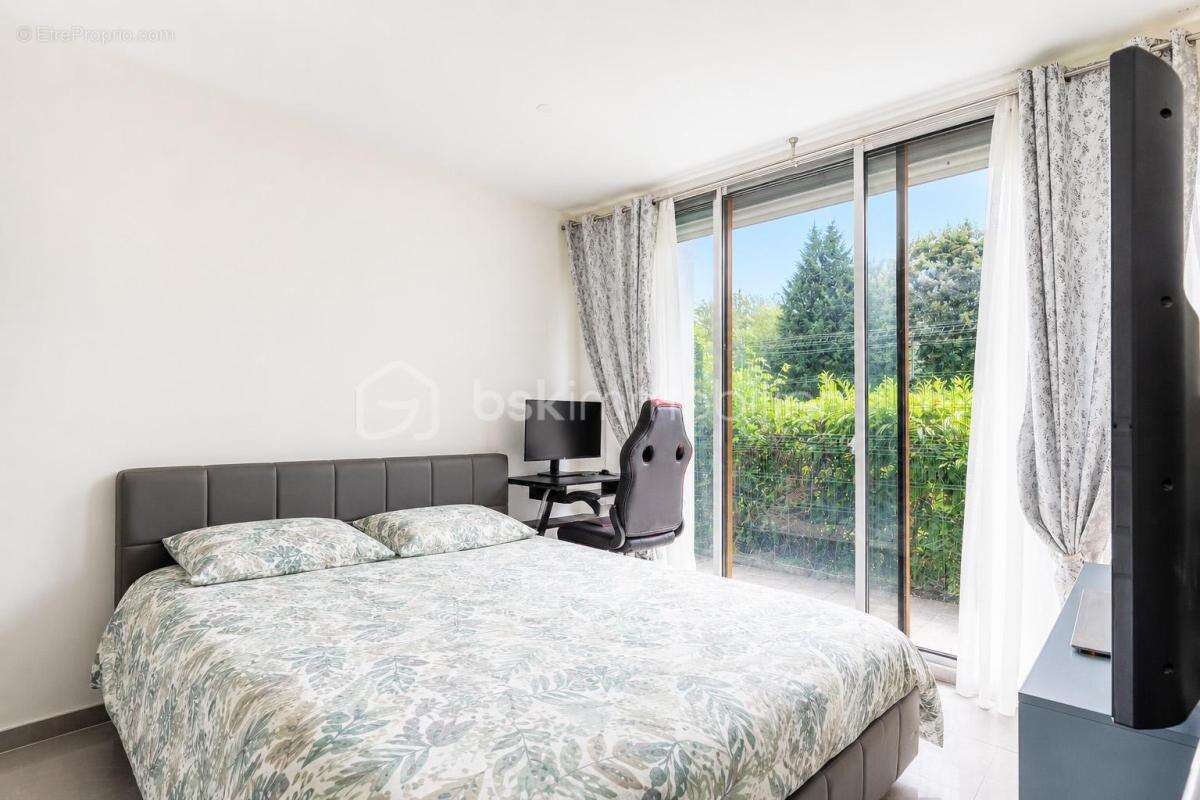 Appartement T3 en rez-de jardin avec loggia - photo 7