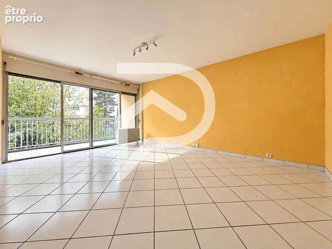 Appartement T3 de 74 m² avec balcon, garage et cave - photo 3