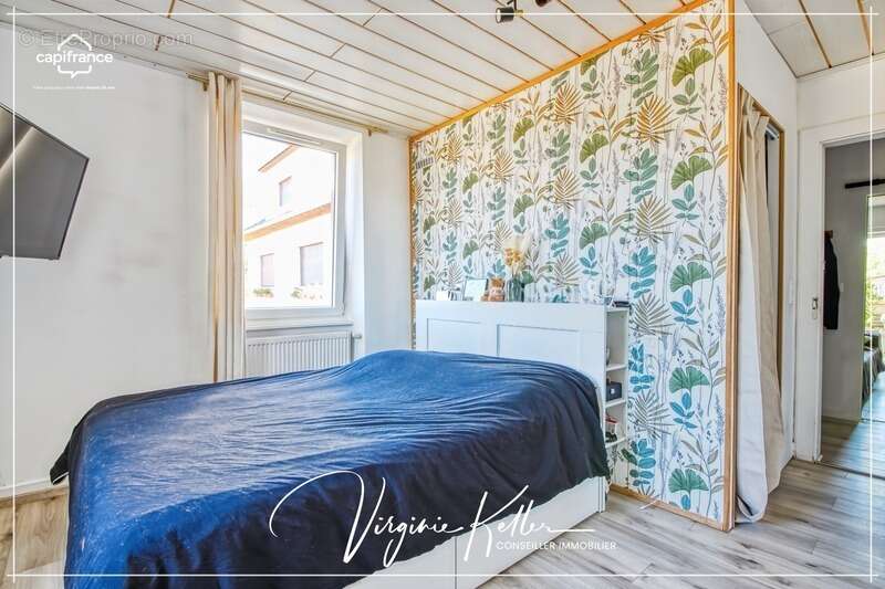 À vendre à ROMANSWILLER (67) - Appartement 3 pièces de 71,35m² - Garage - Remise - Place de parking - Jardin privatif 175 m² - photo 4