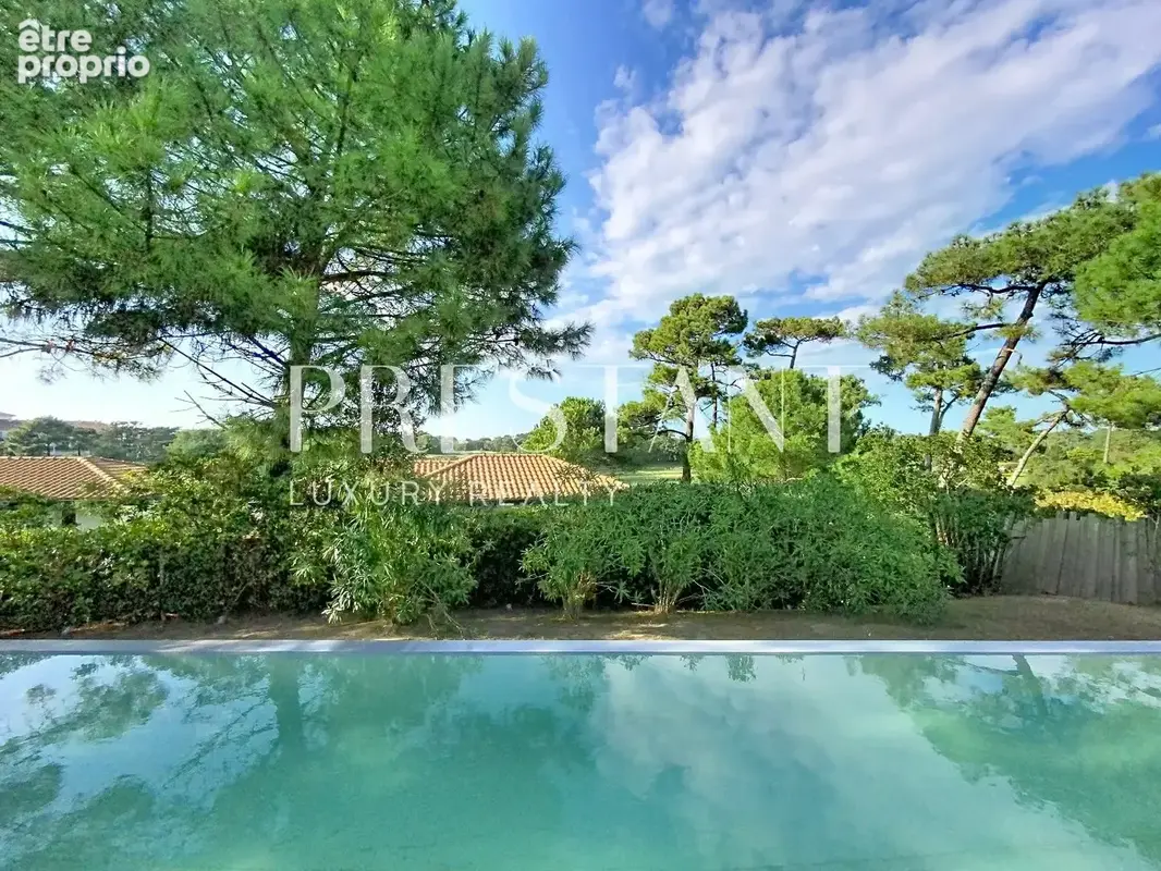 Vente villa contemporaine darchitecte 330 m² à Anglet Chiberta. Vue golf et lac, 5 suites, piscine , Proximité plages. - photo 2