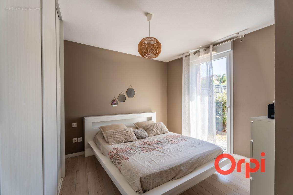 Appartement en rez-de-jardin avec un garage - photo 12